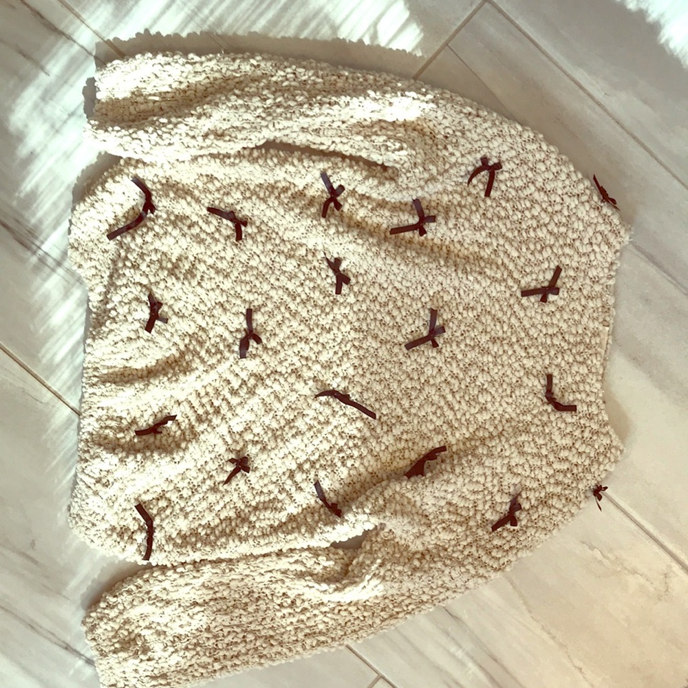 Creme sweater with black bows